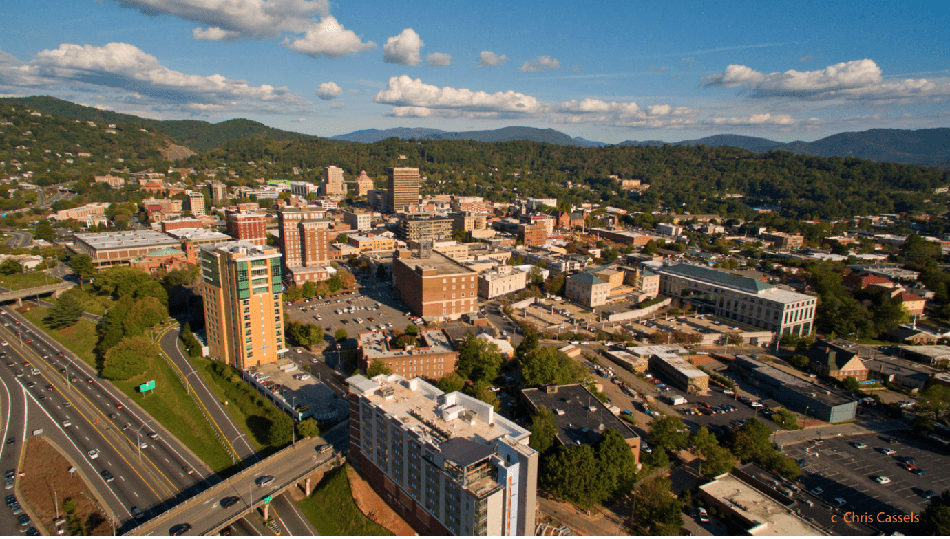 View of downtown Asheville with mountain backdrop
