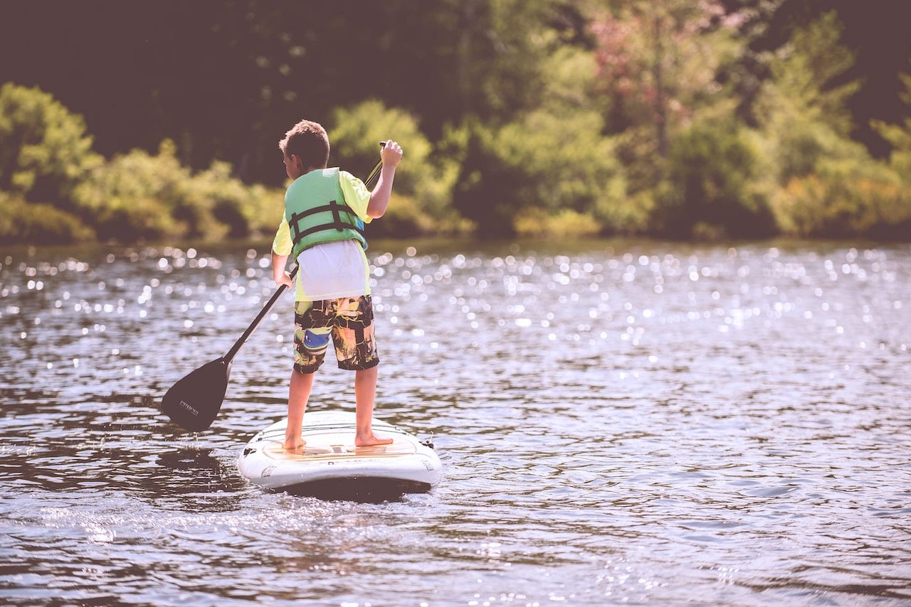 paddle boarding at lake