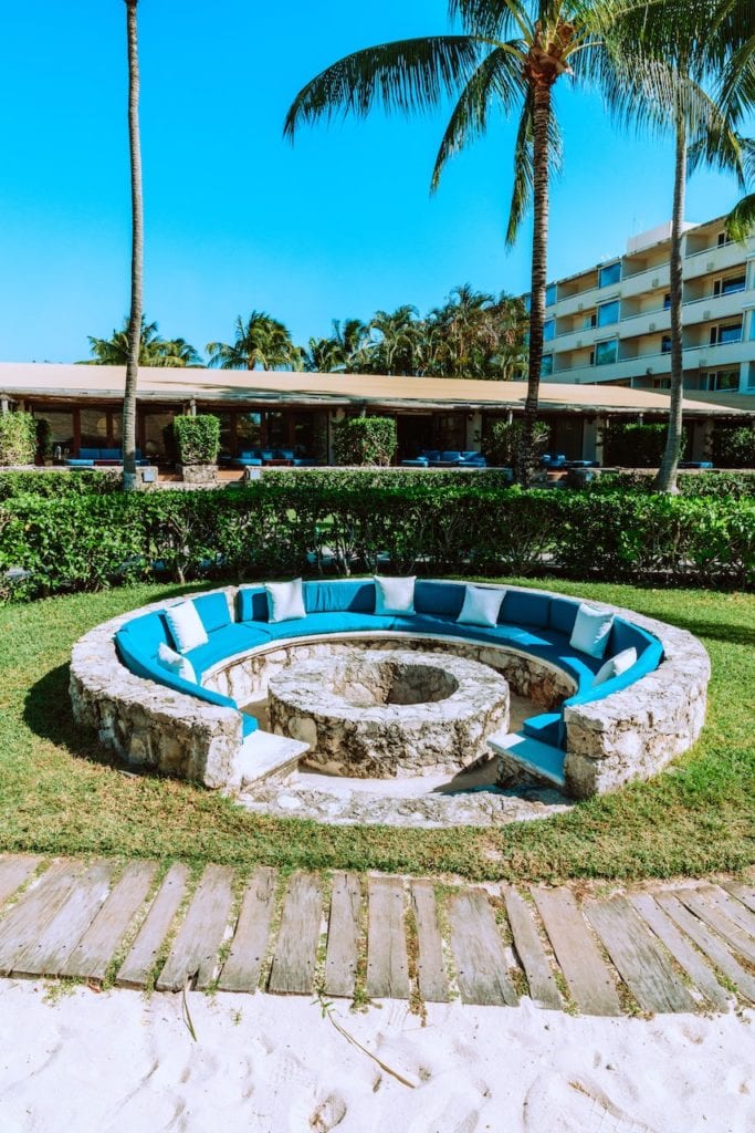 large fire pit with seating area